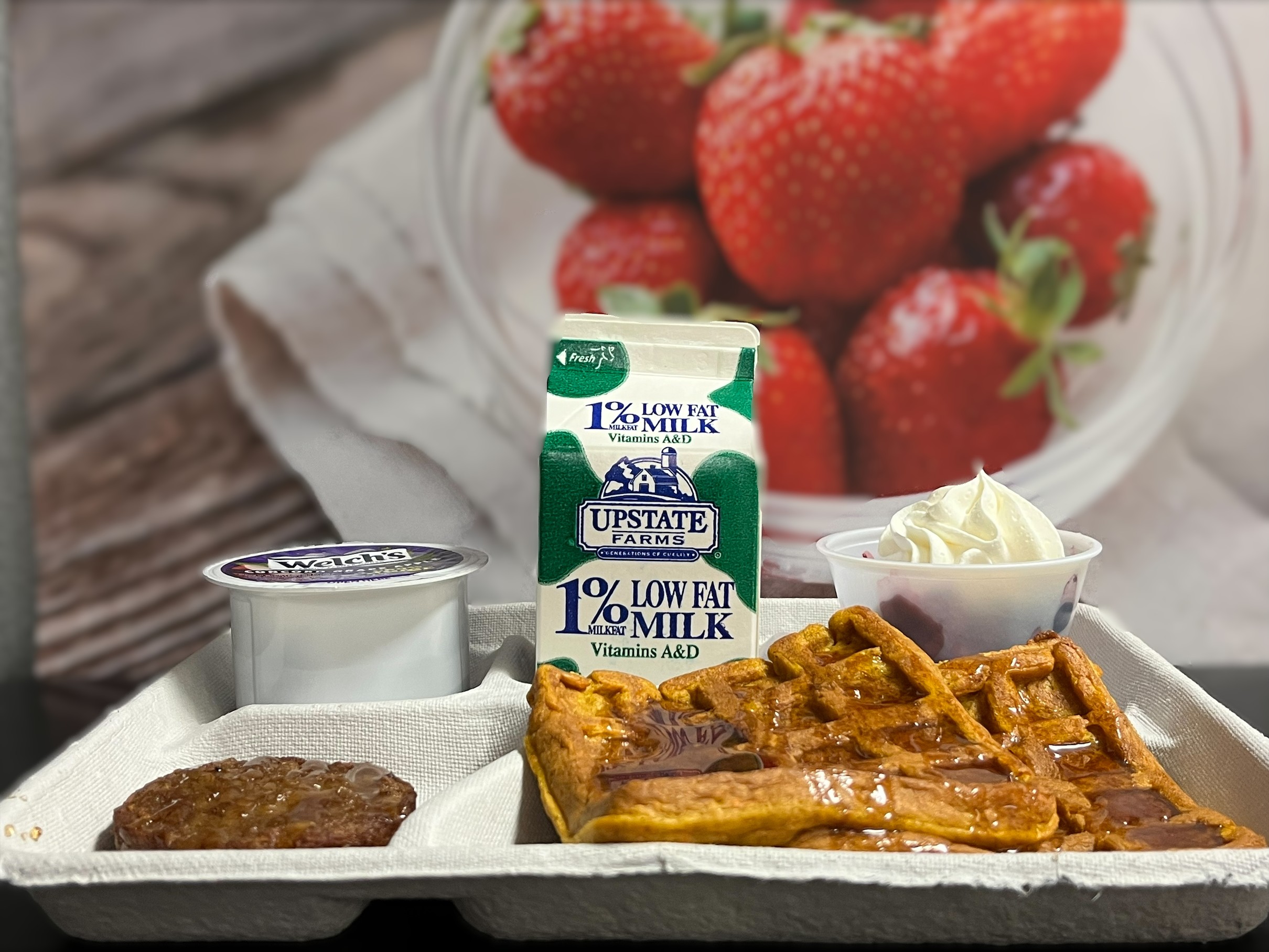 School 208- Lunch served on 10.29.25 NY Carrot Waffles, Breakfast Sausage, Grape Apple Juice, Mixed Berry Cup with Whipped Cream and Milk