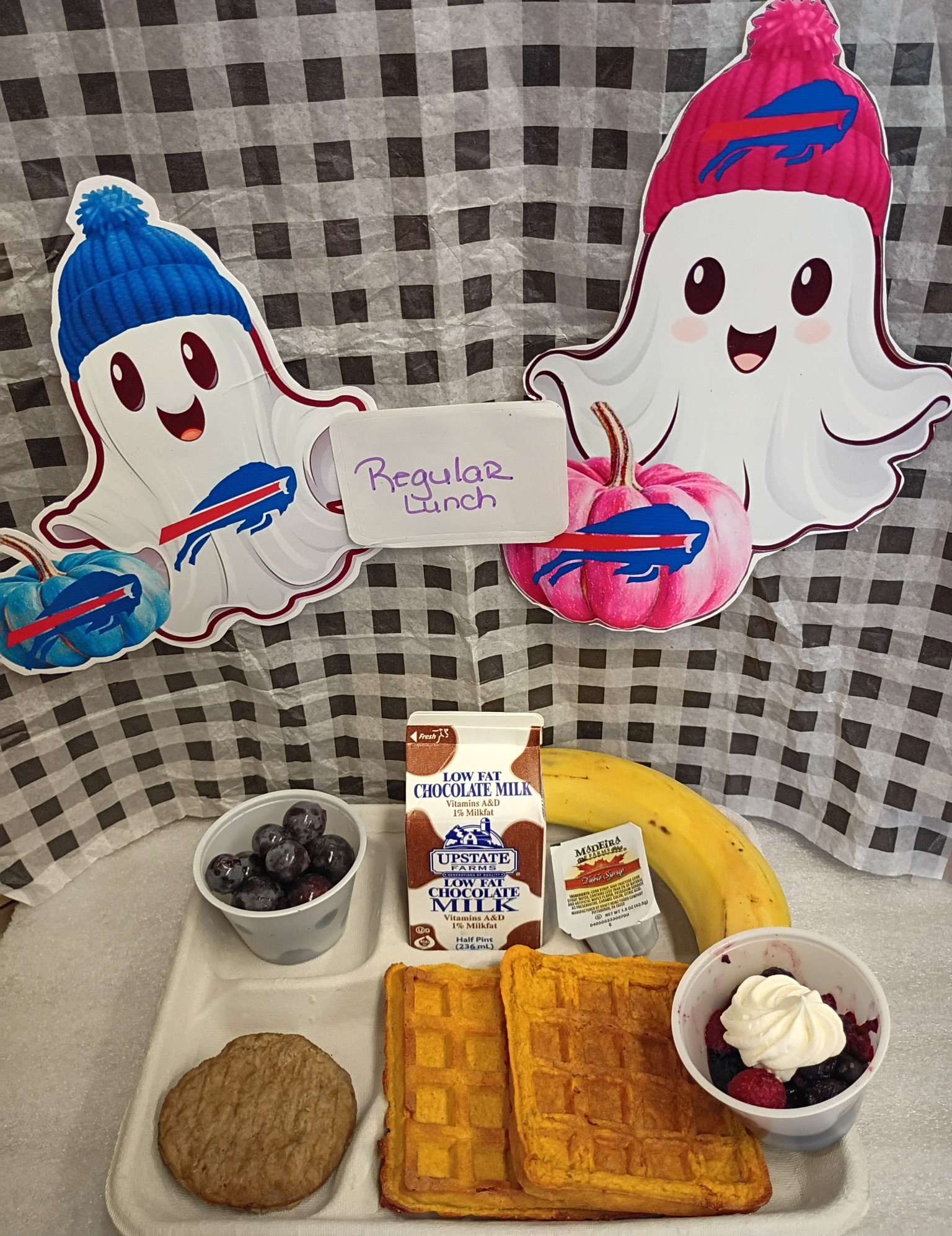 School 207- Lunch served on 10.29.25 NY Carrot Waffles, Breakfast Sausage, NY Grapes, Banana, Mixed Berry Cup with Whipped Cream and Chocolate Milk