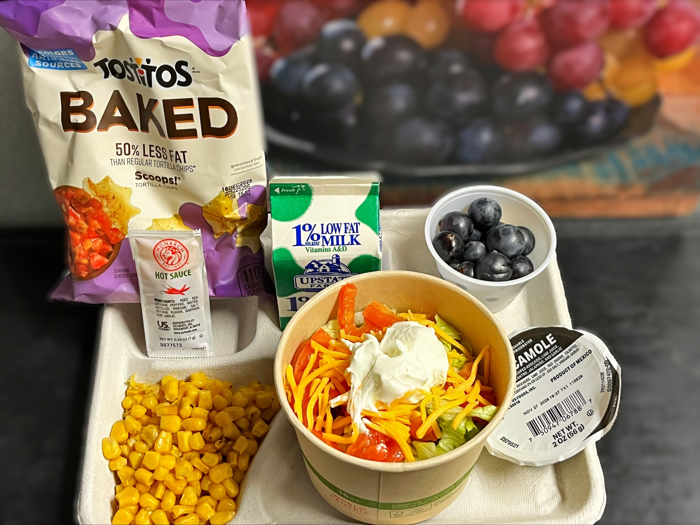 School 208- Lunch served on 11.5.25 Turkey Taco Bowl, Spanish Rice, Fiesta Corn and Black Bean Salad, Tostitos, Sweet Corn, NY Grapes and Milk