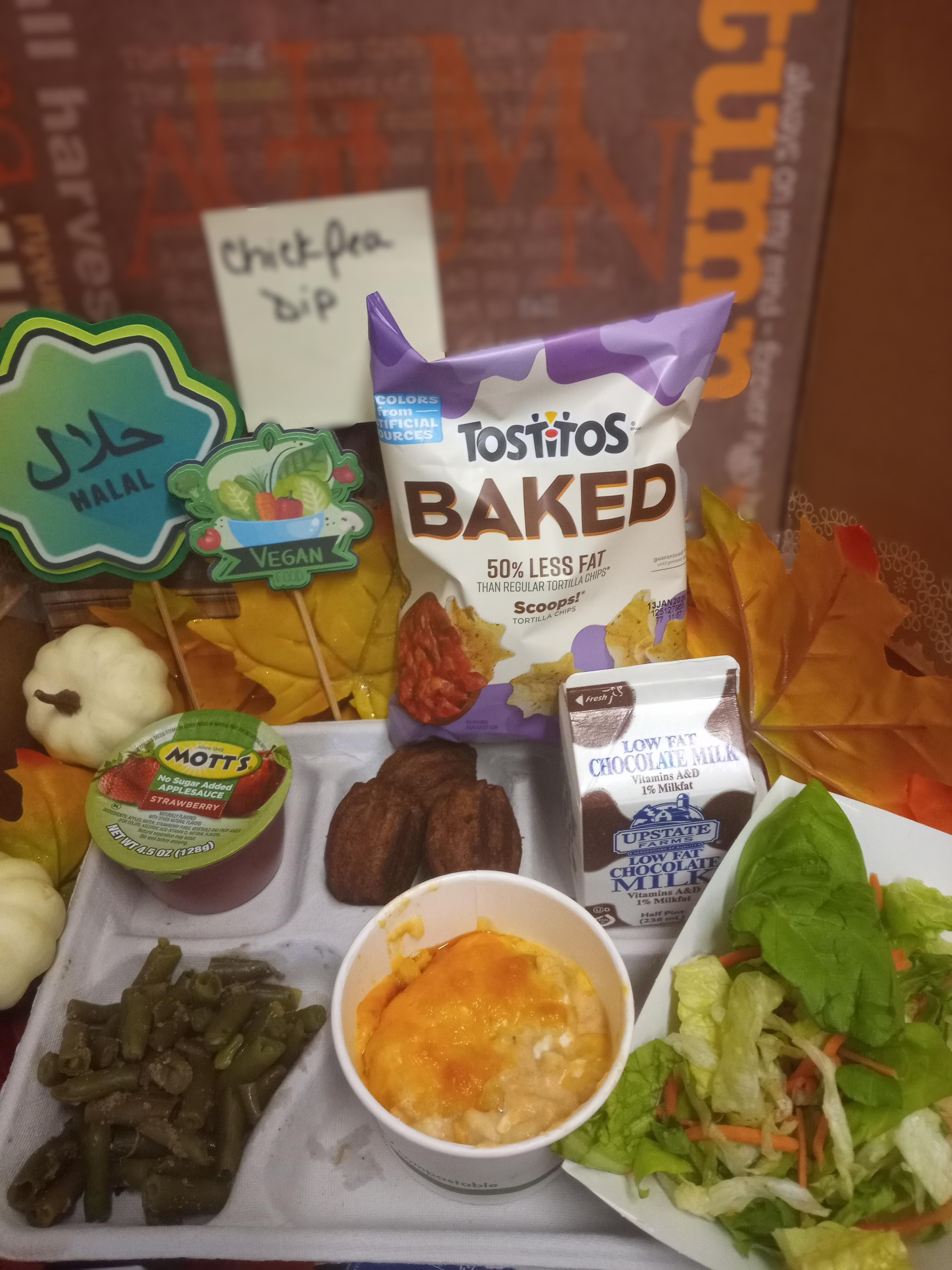 School 207- Lunch served on 11.13.25 Halal-Vegan Buffalo Chicken Pea Dip, Tostitos, Green Salad, Green Beans, Churros bite, Strawberry Apple Sauce and Chocolate milk
