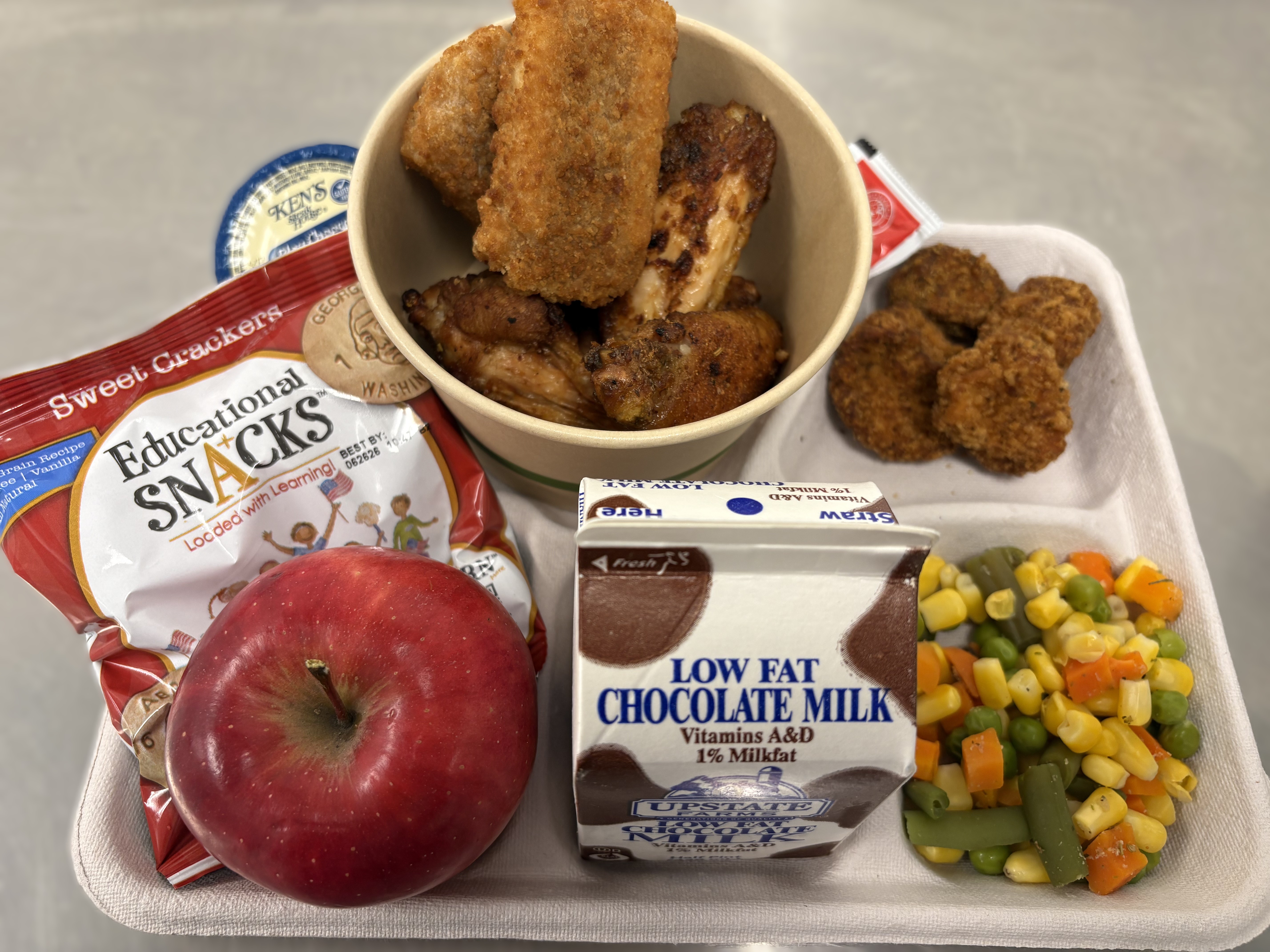 School 50- Lunch served on 11.14.25 Chicken Wing,Pizza Crunchers, Vegetable Medley, Breaded Mushrooms, Apple, Educational Snacks & Chocolate Milk