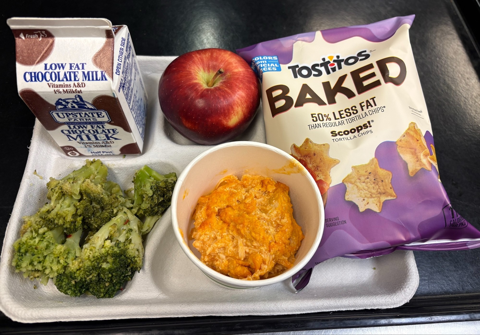 School 72- Lunch served on 2.5.2026 Chicken wing dip, baked Tostitos chips, broccoli, apple and chocolate milk