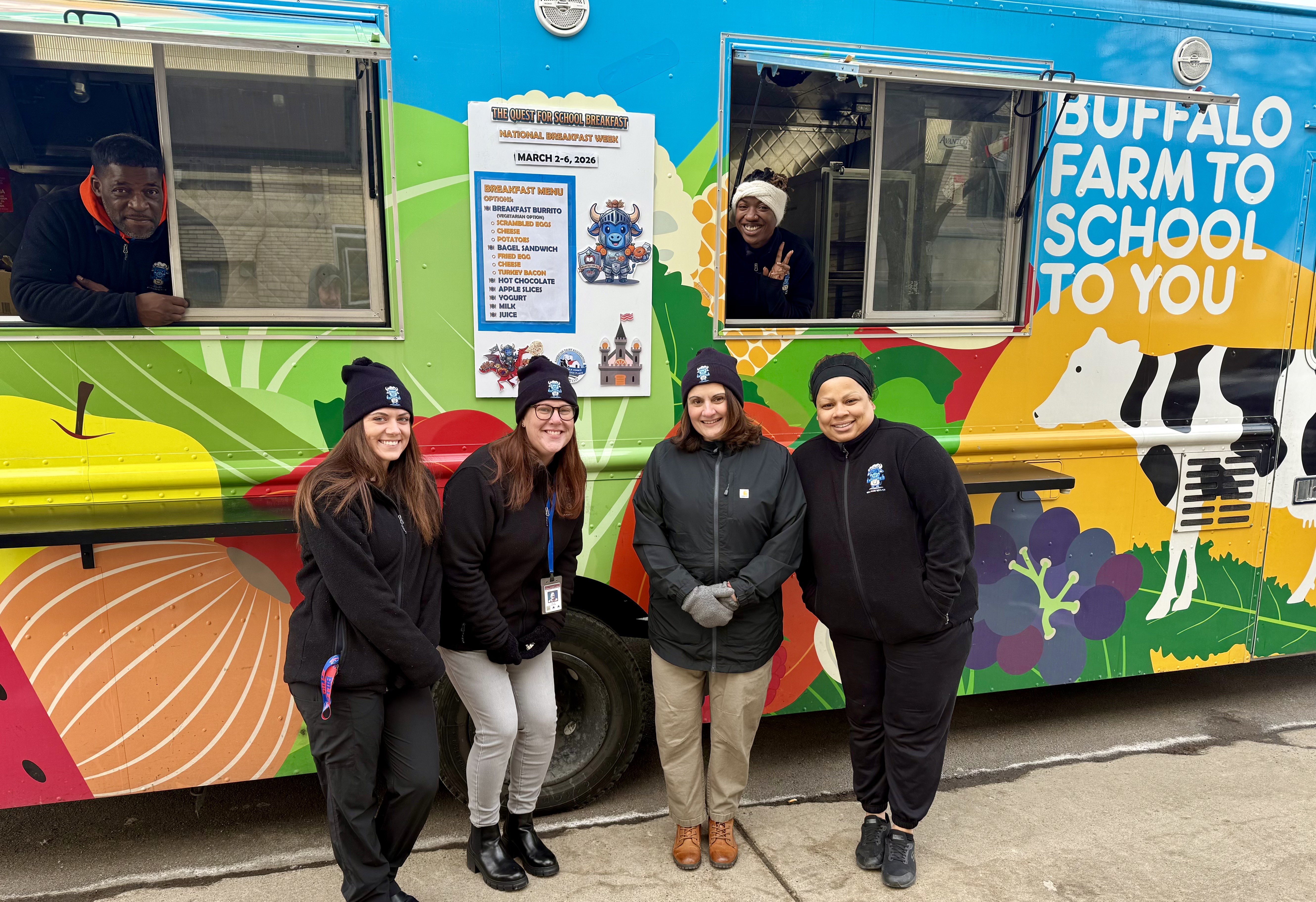 NATIONAL SCHOOL BREAKFAST WEEK PICTURE OF STAFF ON FRONT OF THE FOOD TRUCK