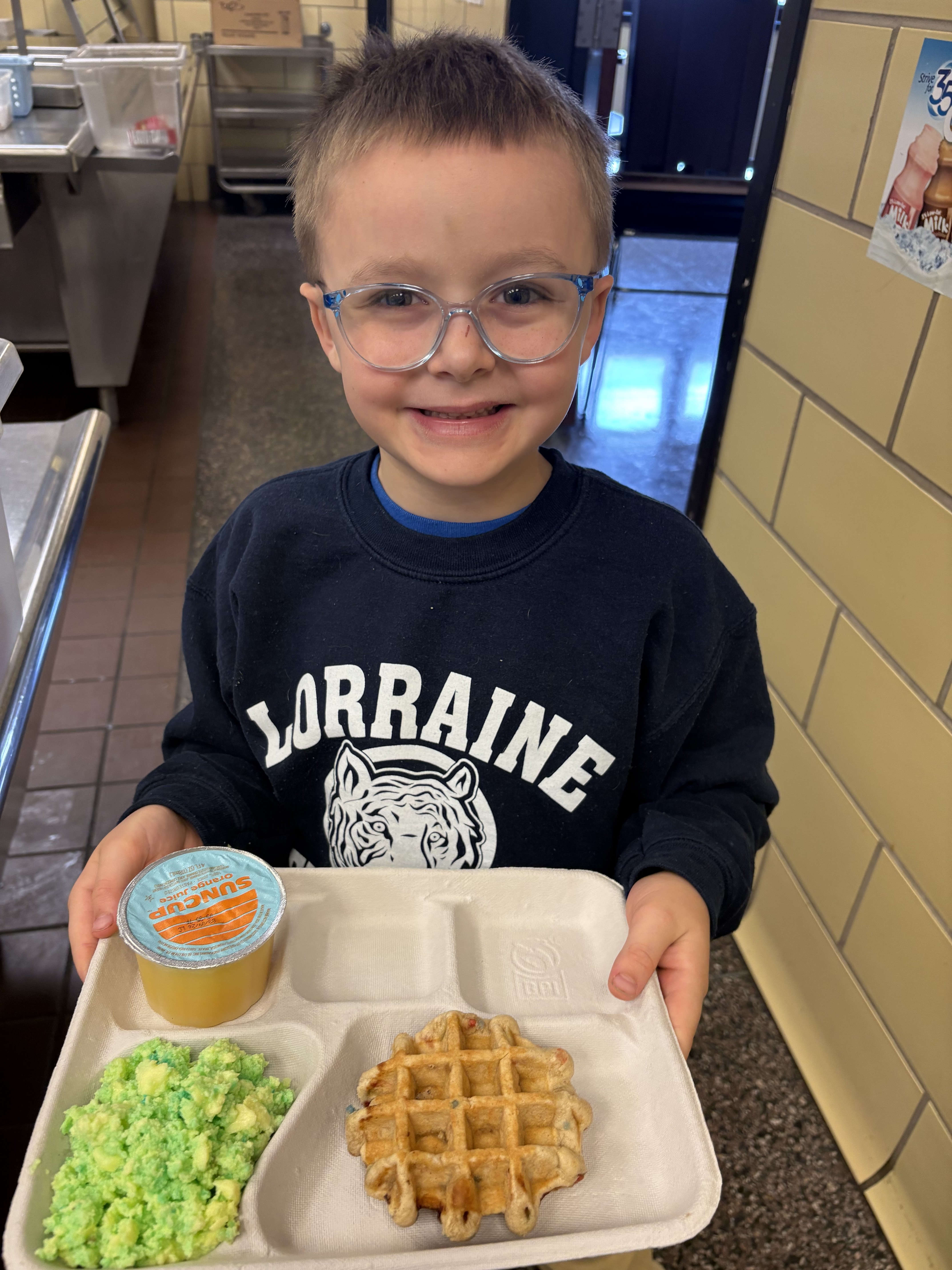 School 72- Breakfast served on 2.27.26 for Read Across America Green eggs, waffles and orange juice