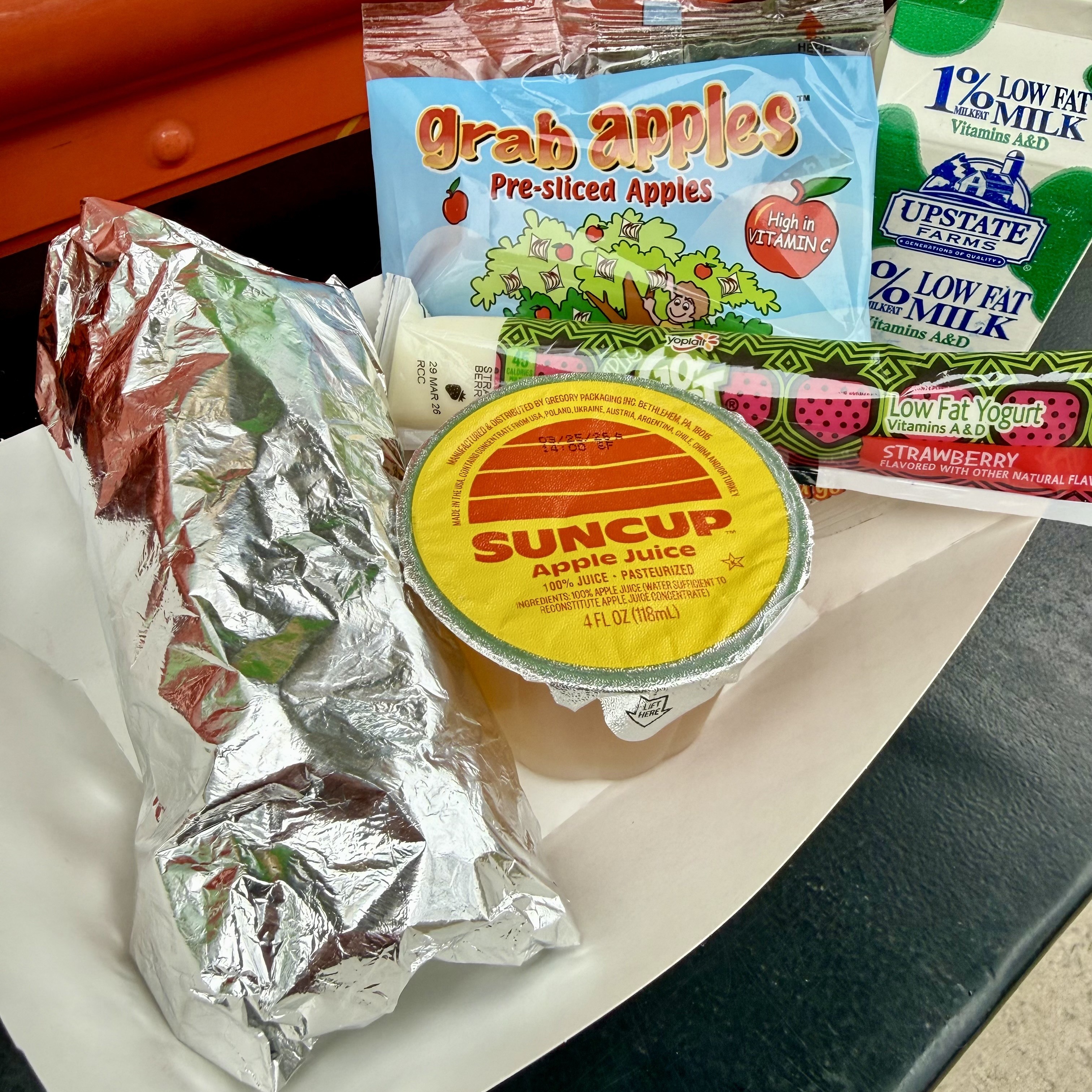  Food Truck Picture Wrapped Breakfast Burrito, Strawberry Yogurt, Apple Juice, Milk, Apple Slices