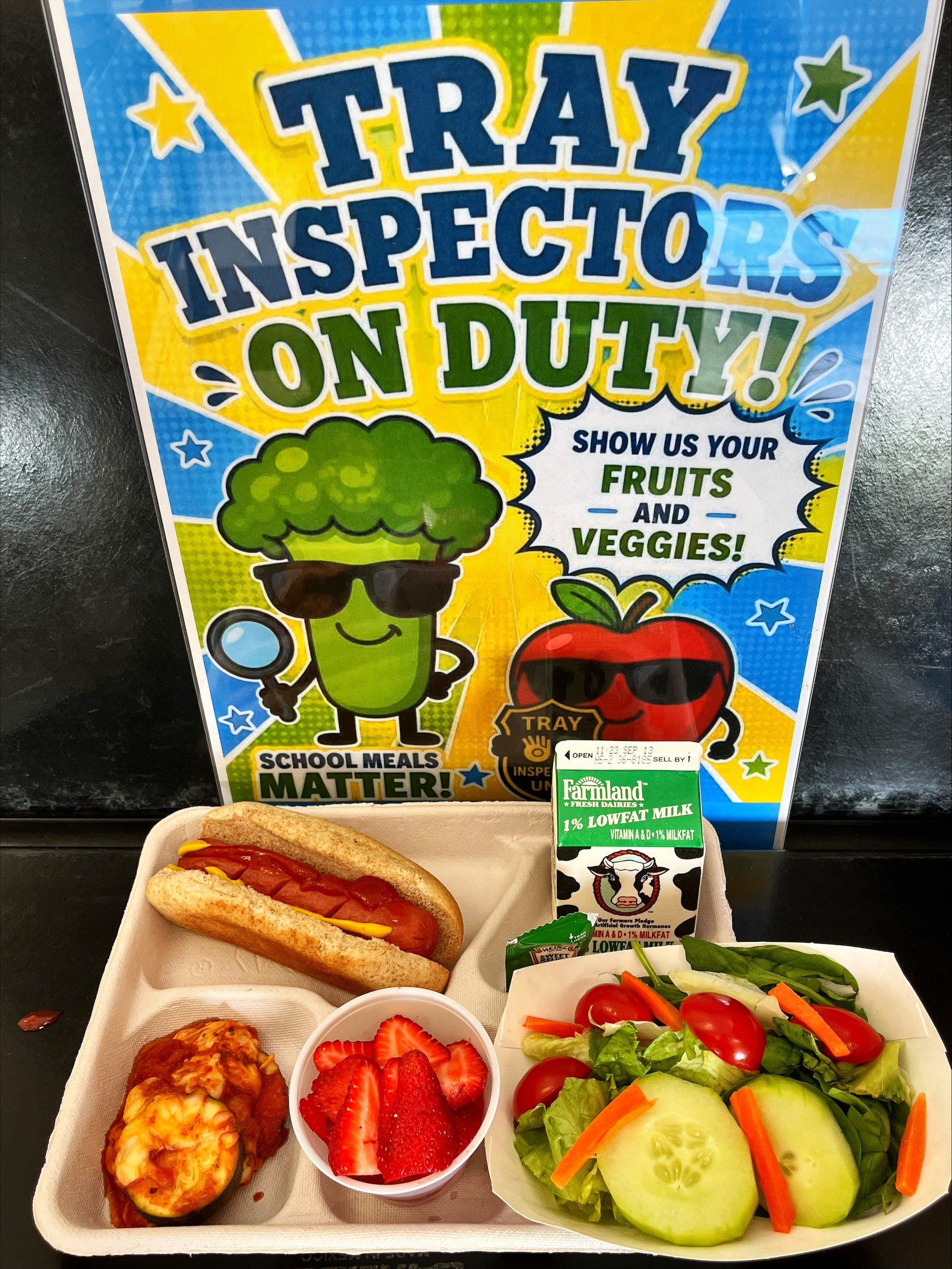School 363- Lunch served on 9.10.26 NY Beef Hot Don on WG Bun, NY Zucchini Parmesan NY garden Salad, Strawberries & Milk