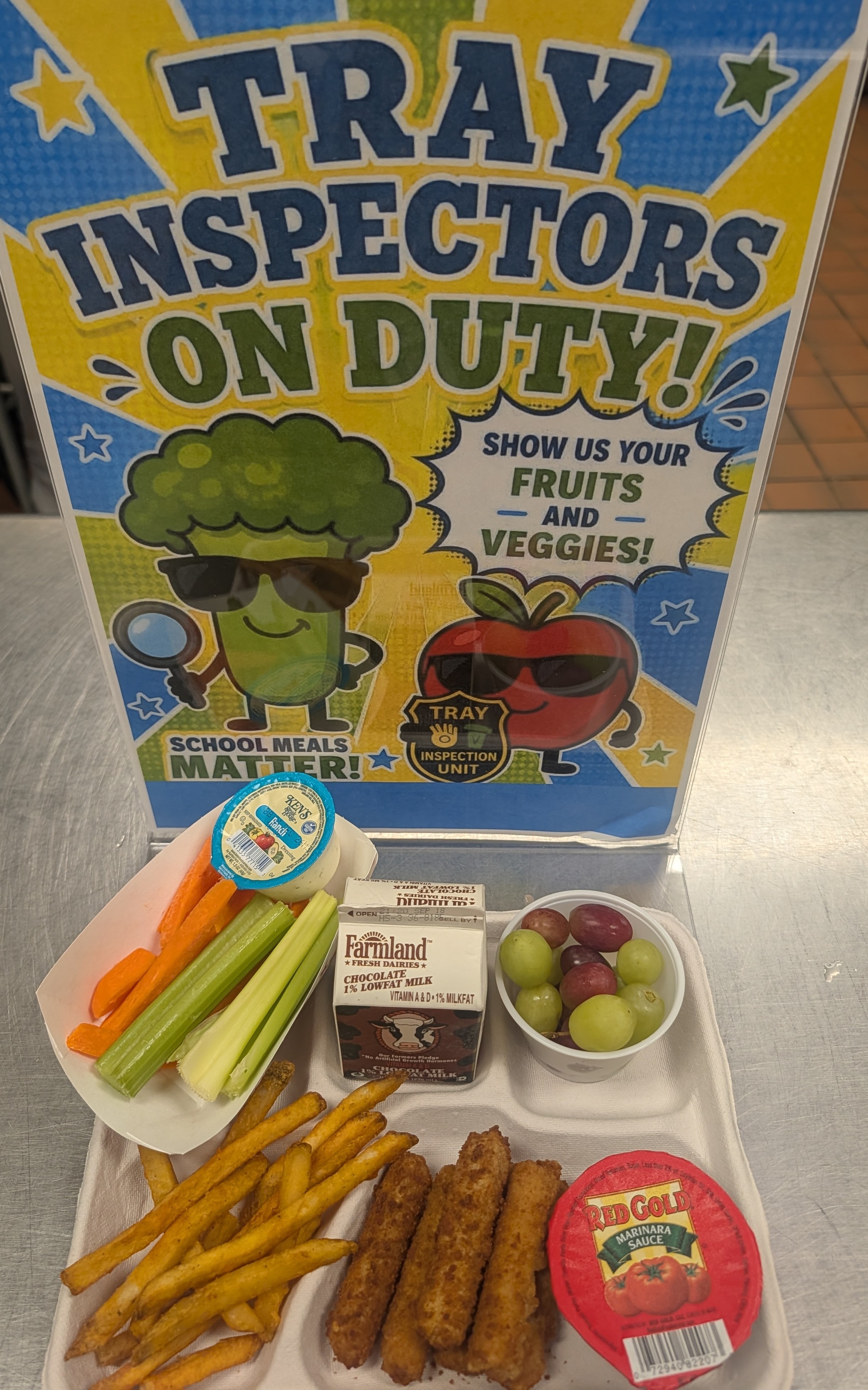 School 305- Lunch served on 9.14.26 Mozzarella Stick, Marinara Cup, French Fries, Celery&Carrot Sticks, Ranch Dressing, Grapes and Chocolate Milk