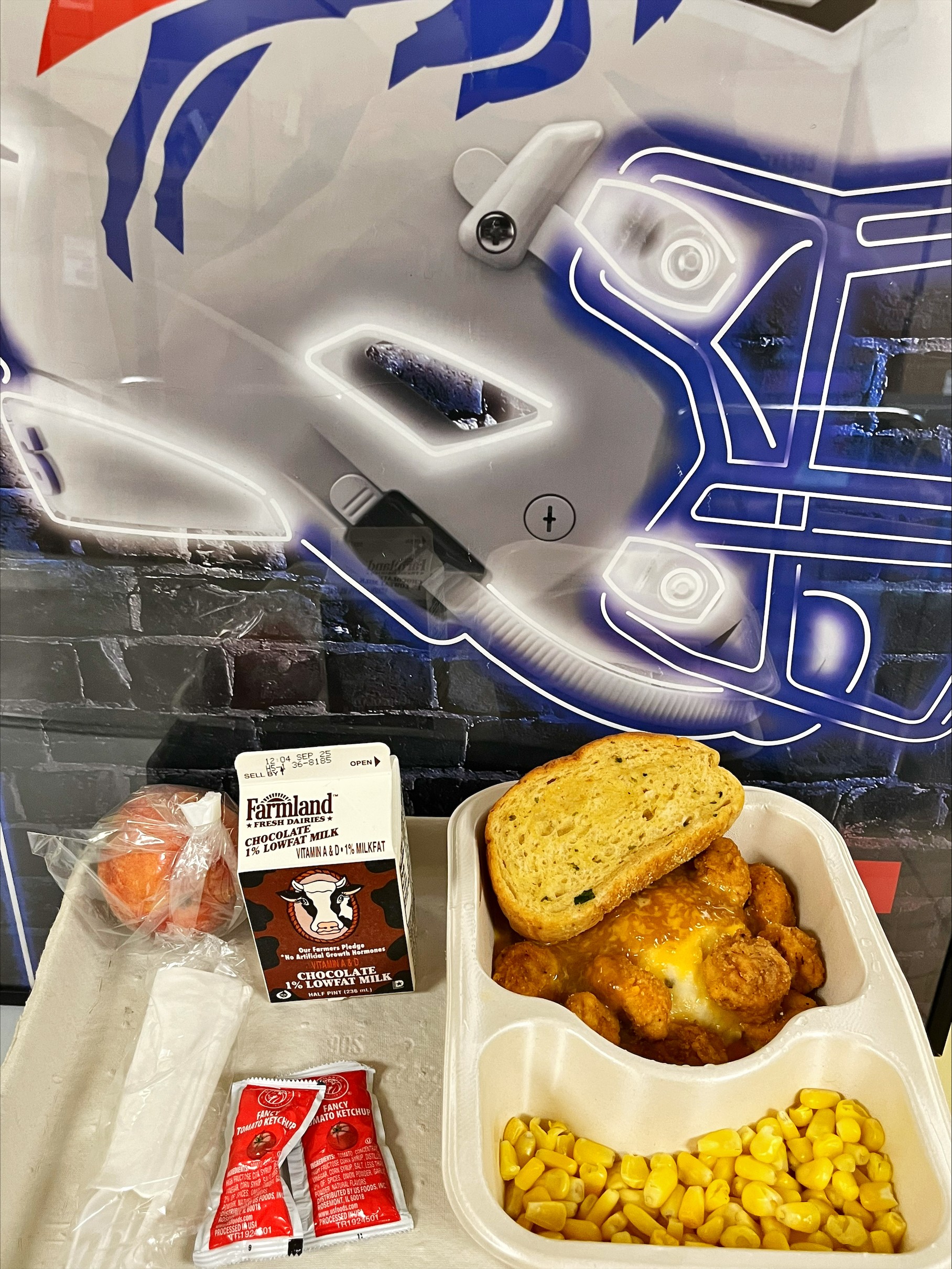 School 65- Lunch served on 9.16.26 ,Popcorn Chicken, Mashed Potatoes, Sweet Corn, Shredded Cheddar , Texas Toast, Orange and Chocolate Milk
