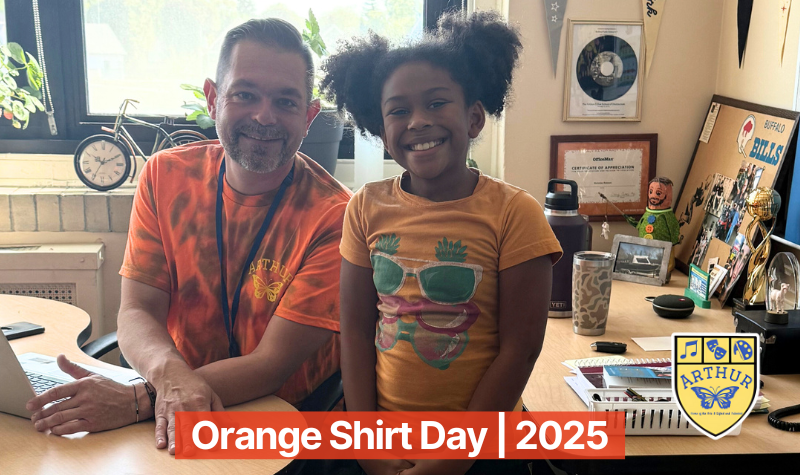 Teacher and Student Wearing Orange Shirt