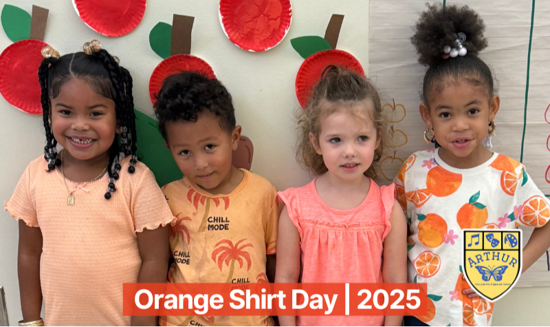 4 Young  Students Wearing Orange Shirt