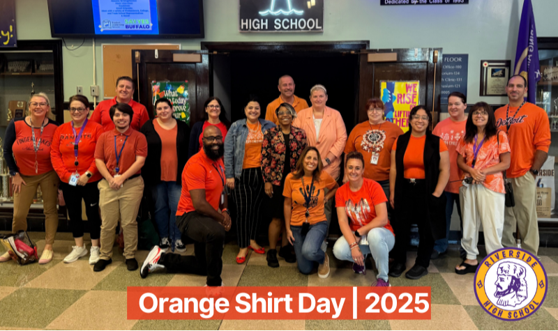 Riverside 207 Staff Wearing Orange Shirt in Group photo