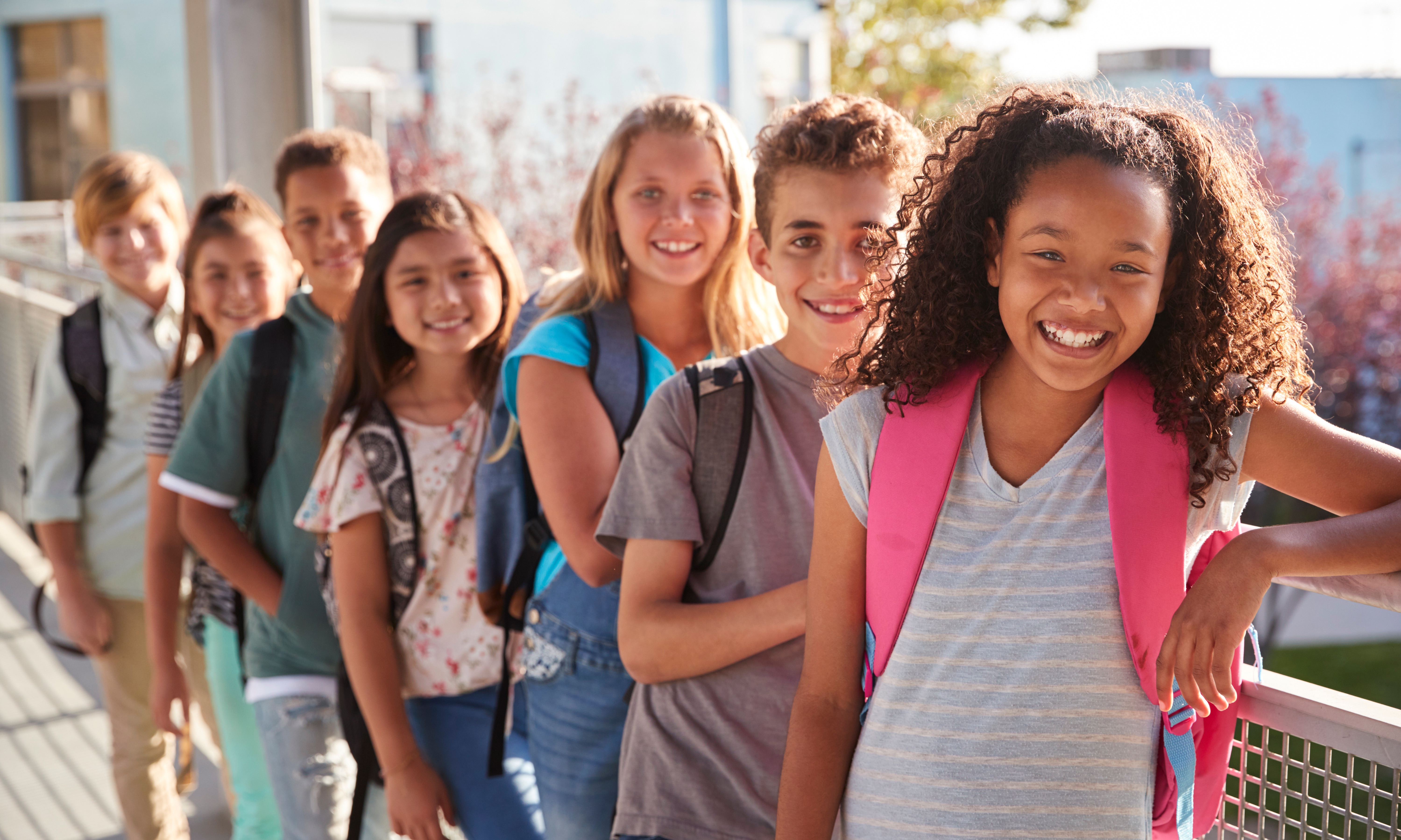 students in line smiling