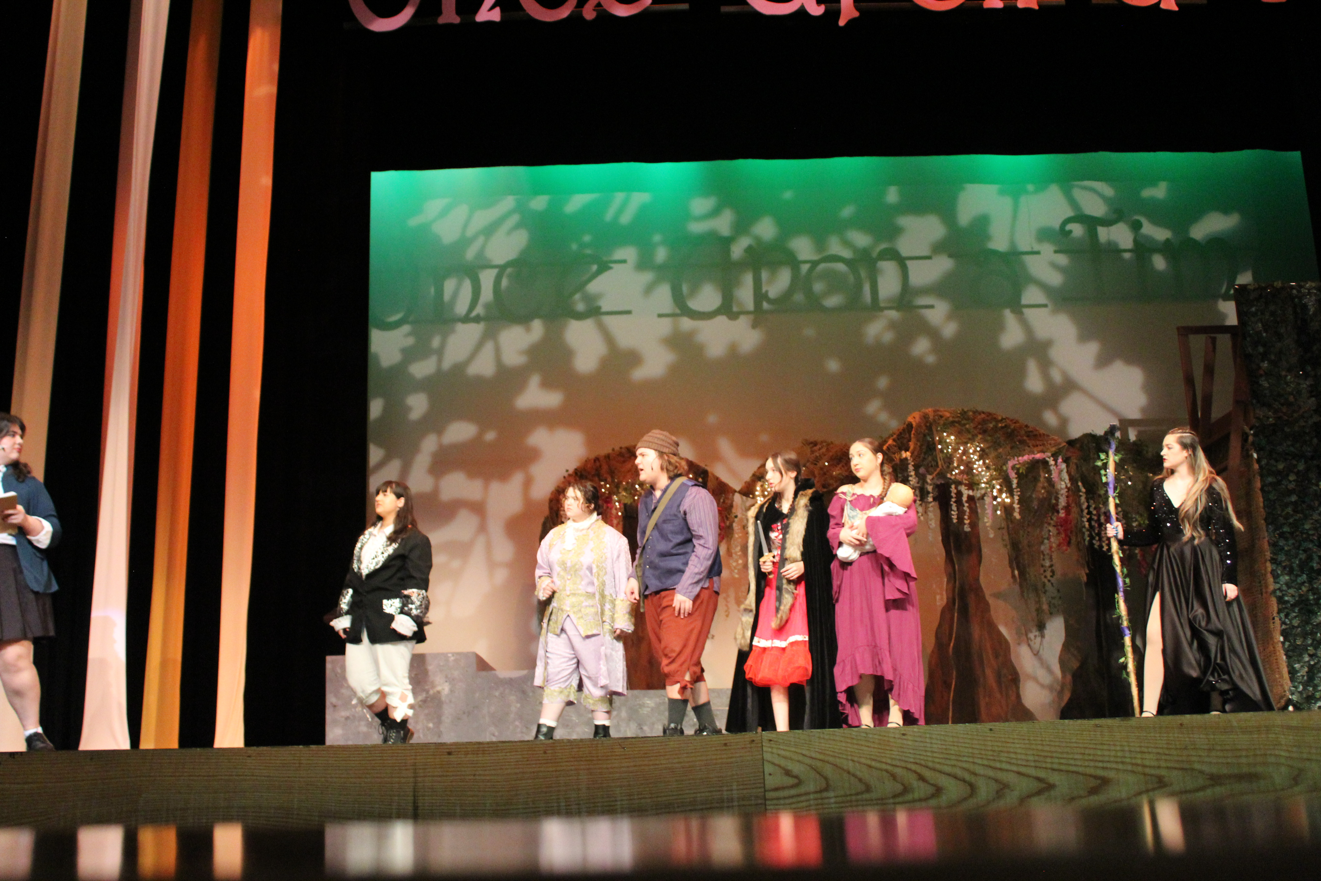 Students acting on stage