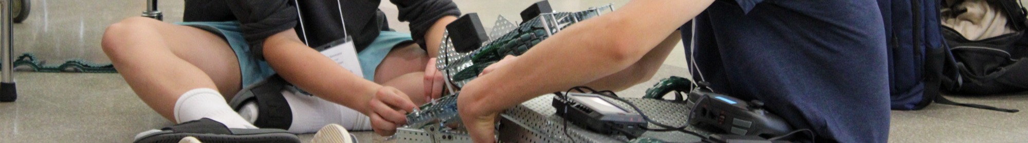 Students working in mechanical project