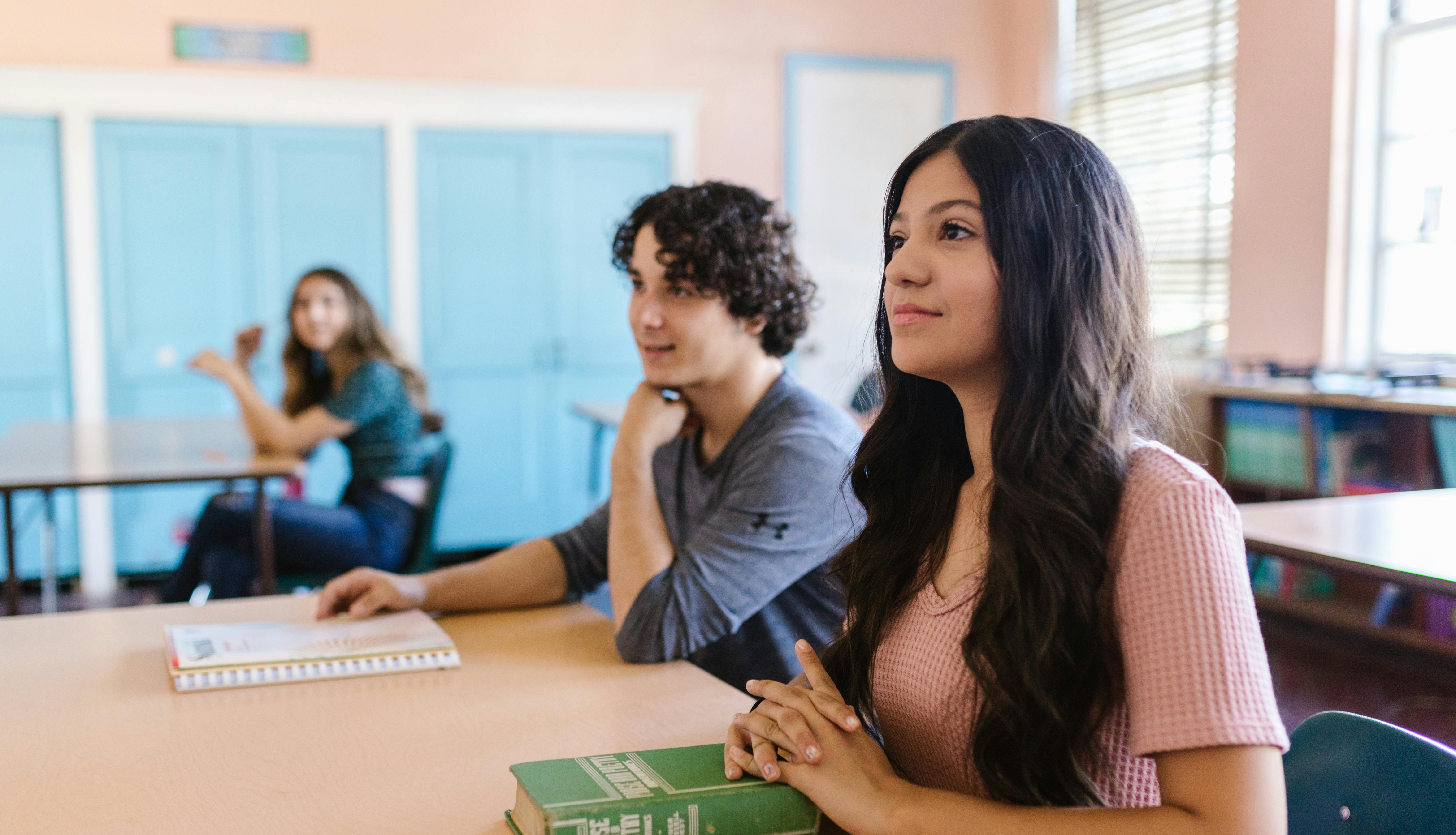 Two students paying attention