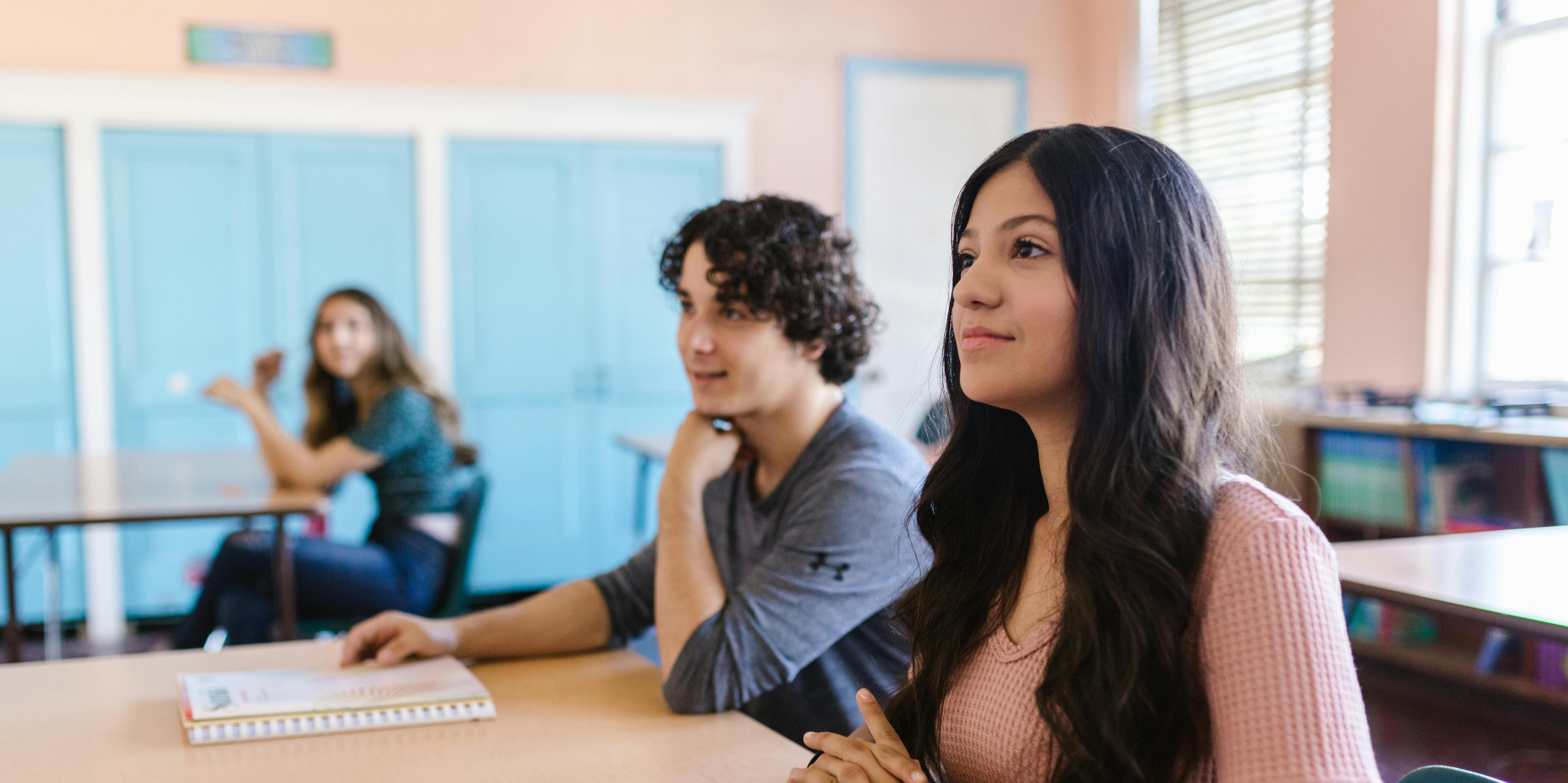 Two students paying attention