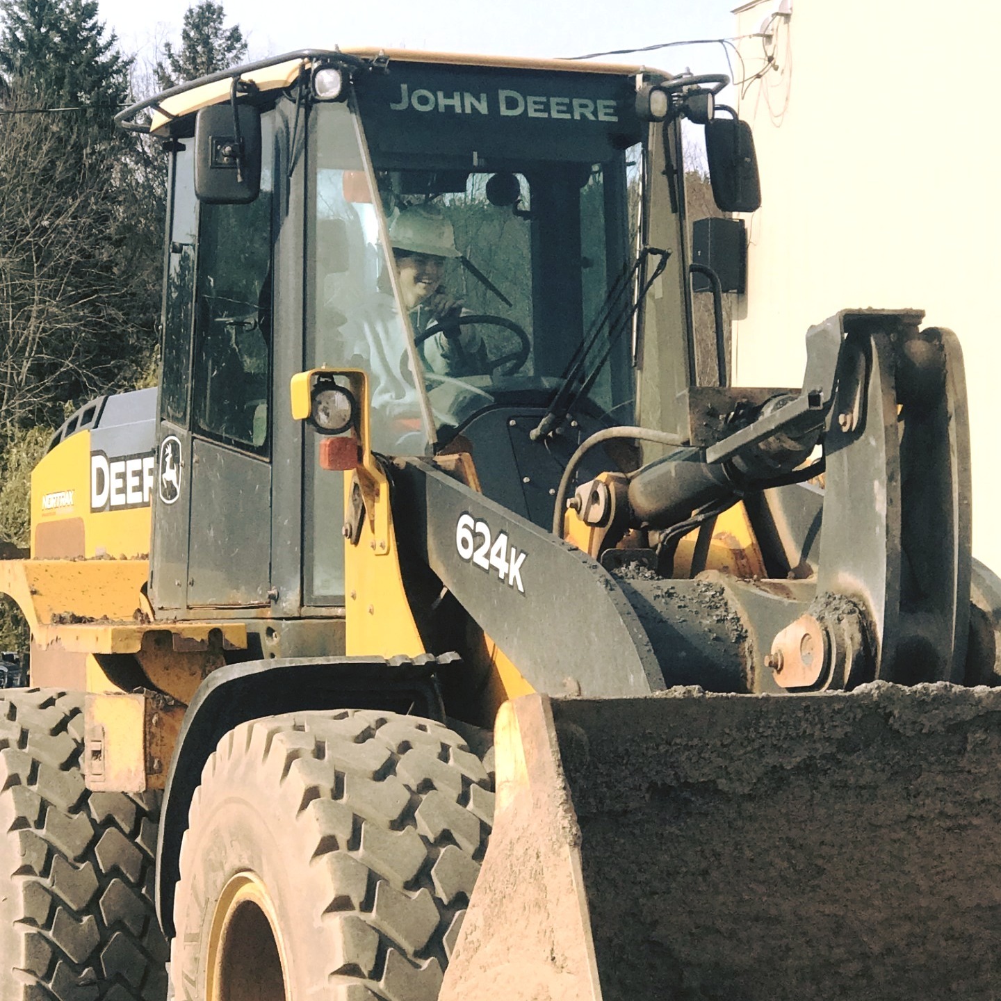 A man was driving a tractor