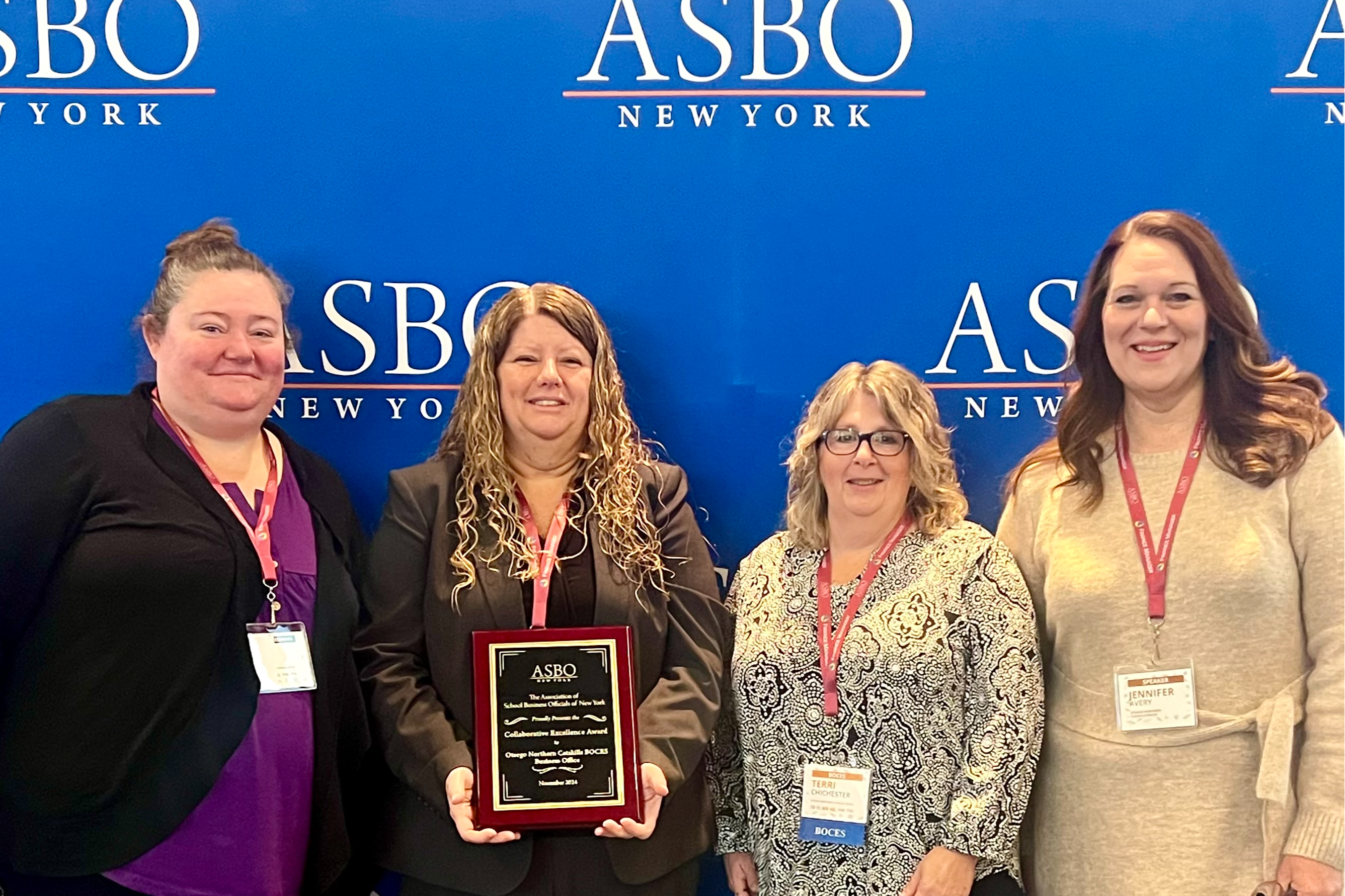 Tara, Lynn, Terri, and Dr. Avery receiving ASBO award.