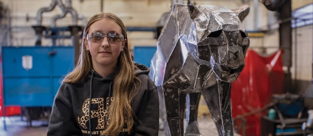 student welder with panther