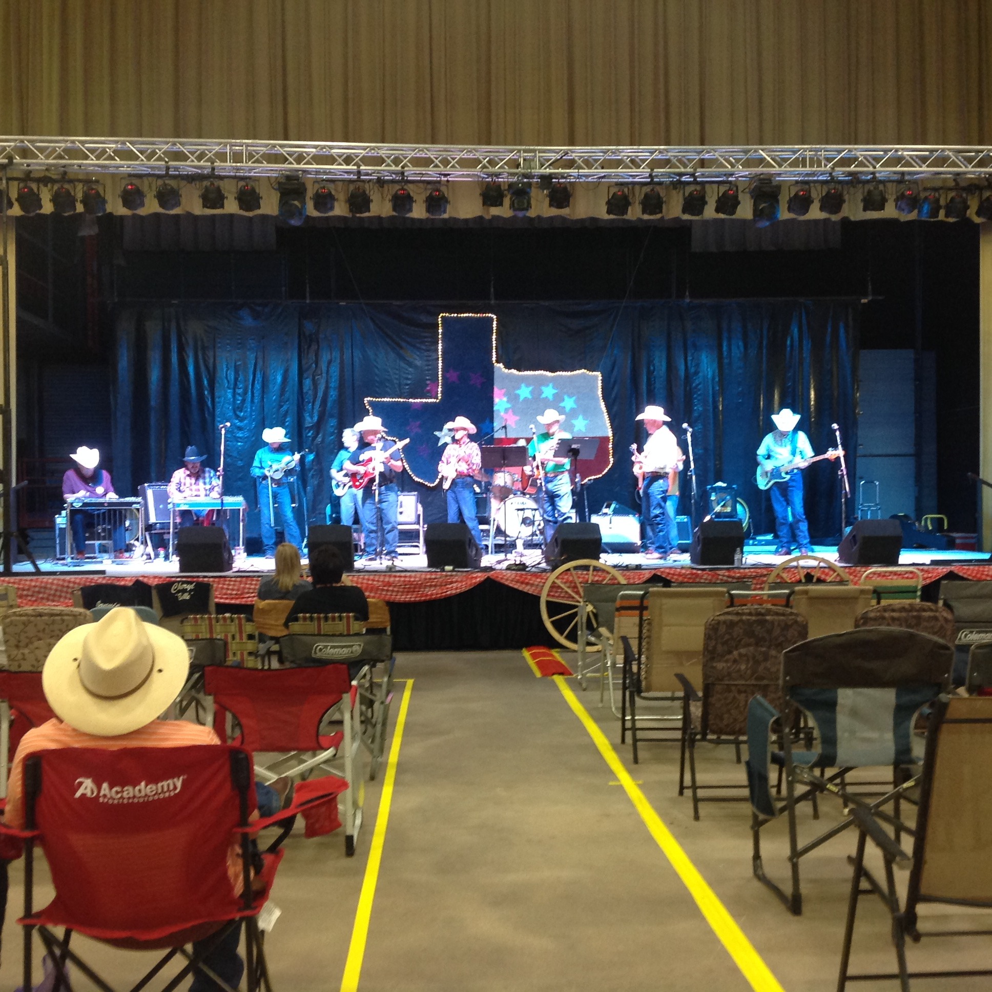 Band on a stage with Texas decor