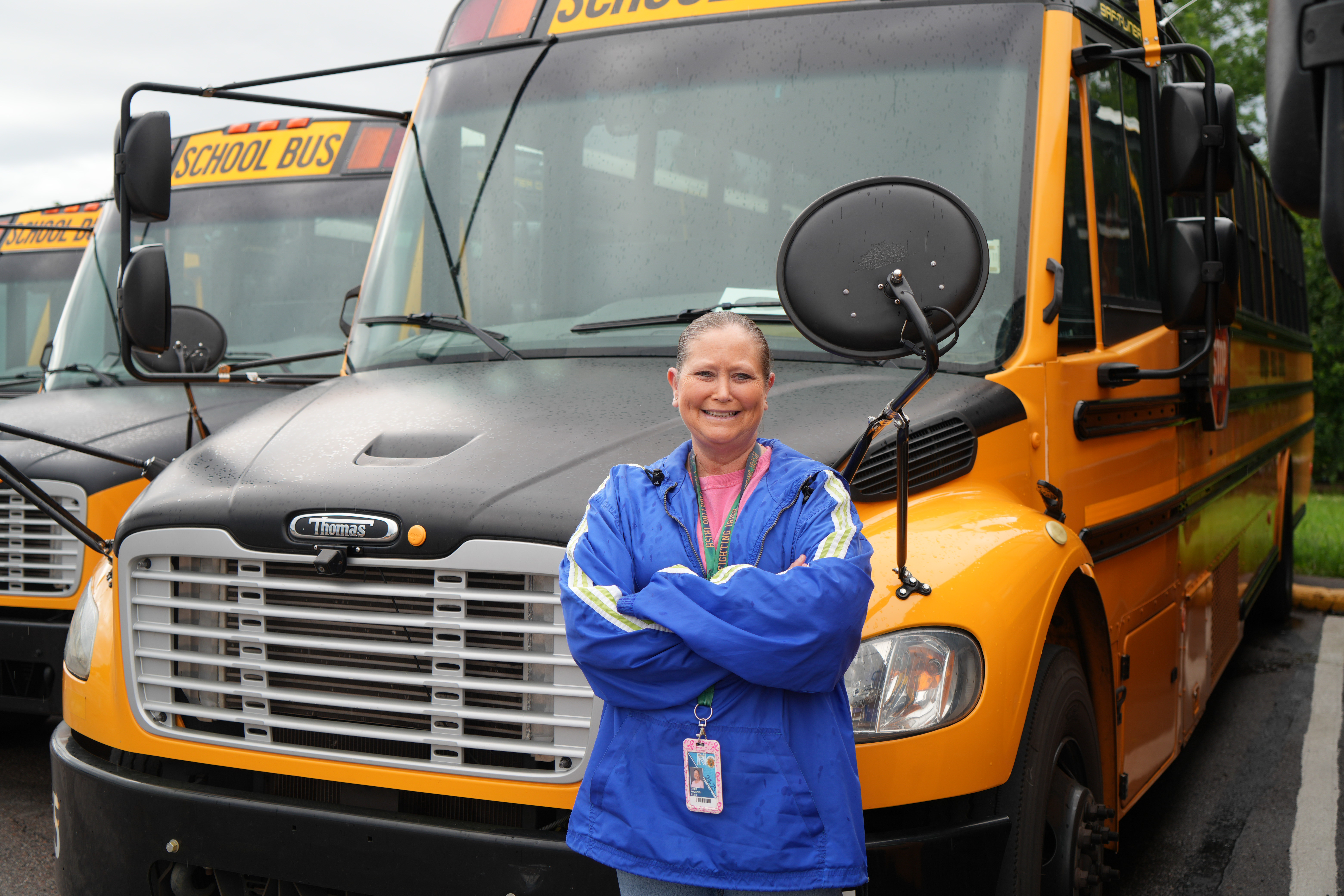 bus driver infront of bus