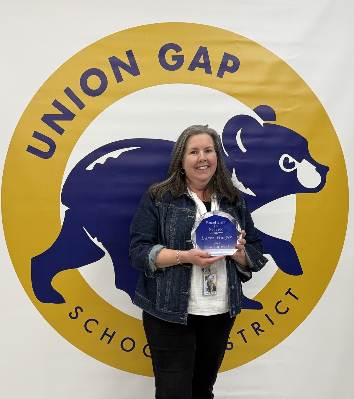 Photo of Laura Harper w/ Award