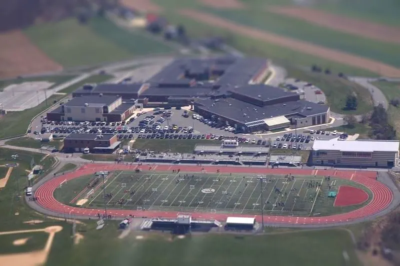 An aerial view of Twin Valley High School and a football field. 