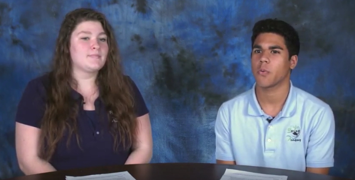 Heritage News preview of the video, two students talking with each other