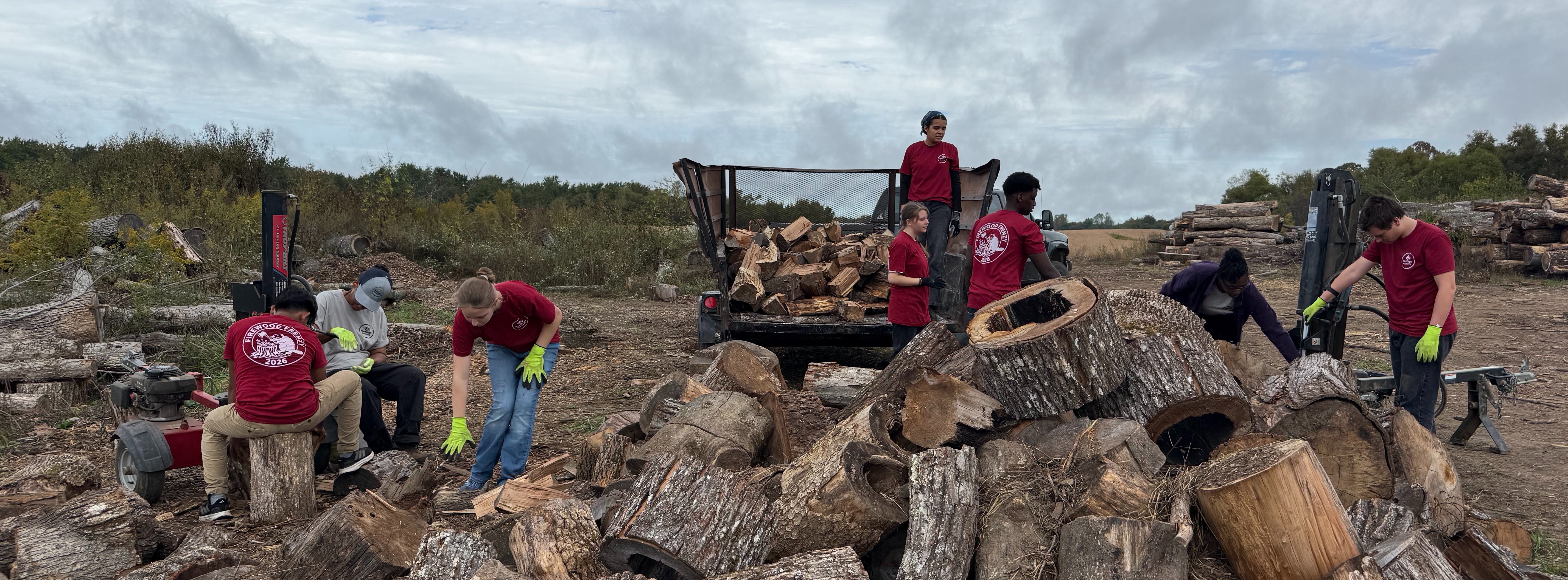 students cutting wood