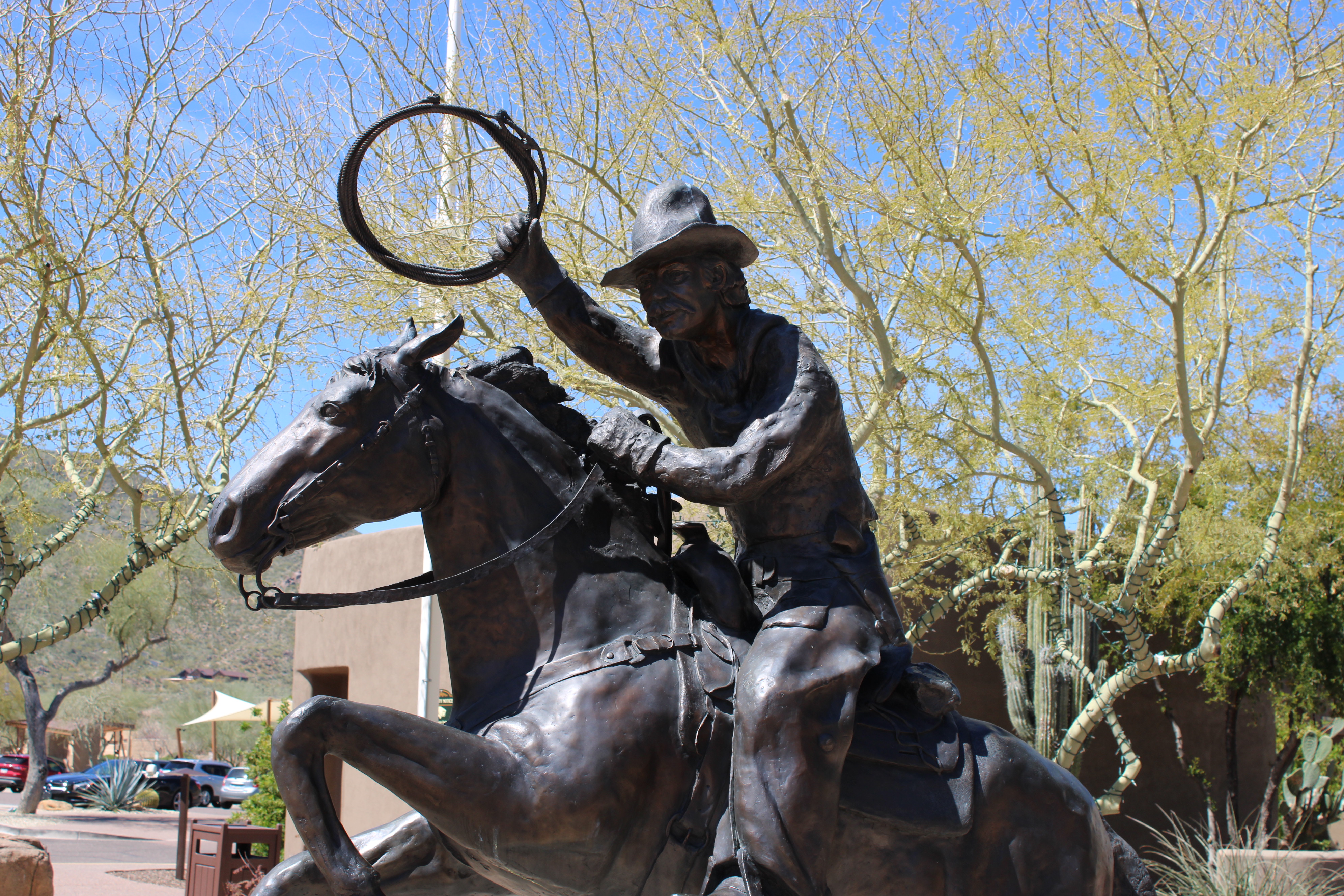 Bronze cowboy statue