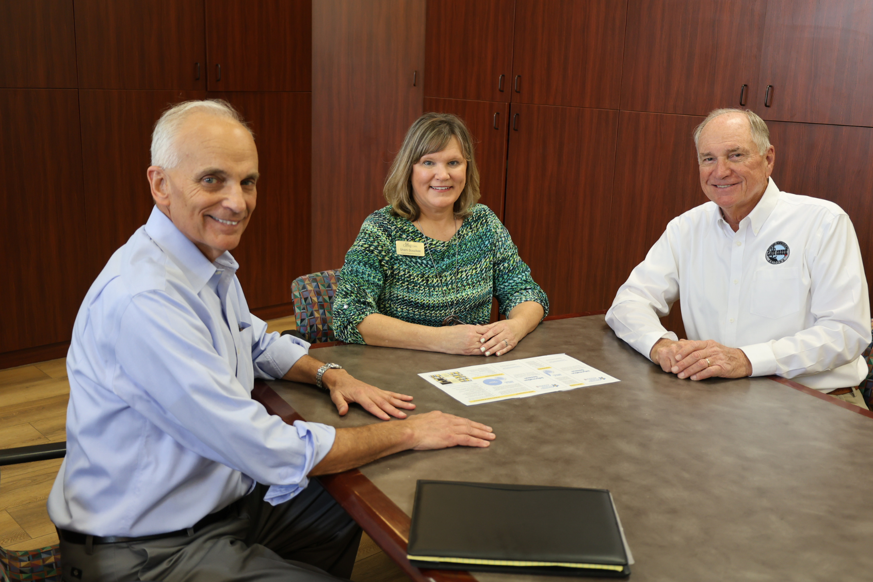 Carefree Mayor John Crane, Foothills Caring Corp Employee Sherri, and Cave Creek Mayor Bob Morris