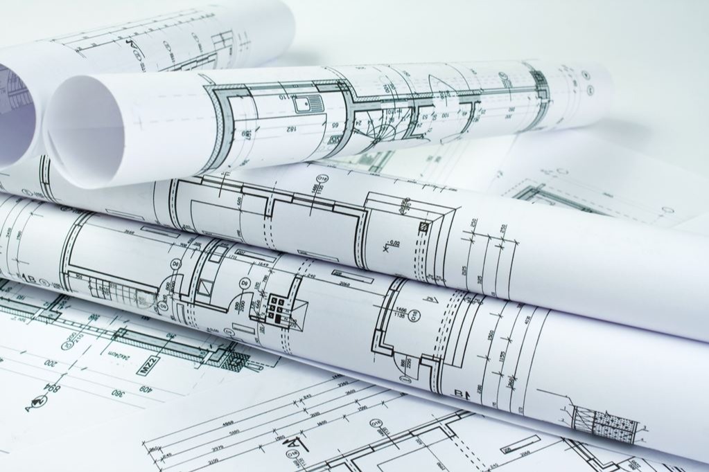 Building plans in a pile