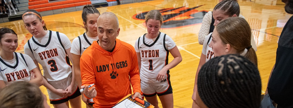 Coach Yerly talks to the team during a timeout