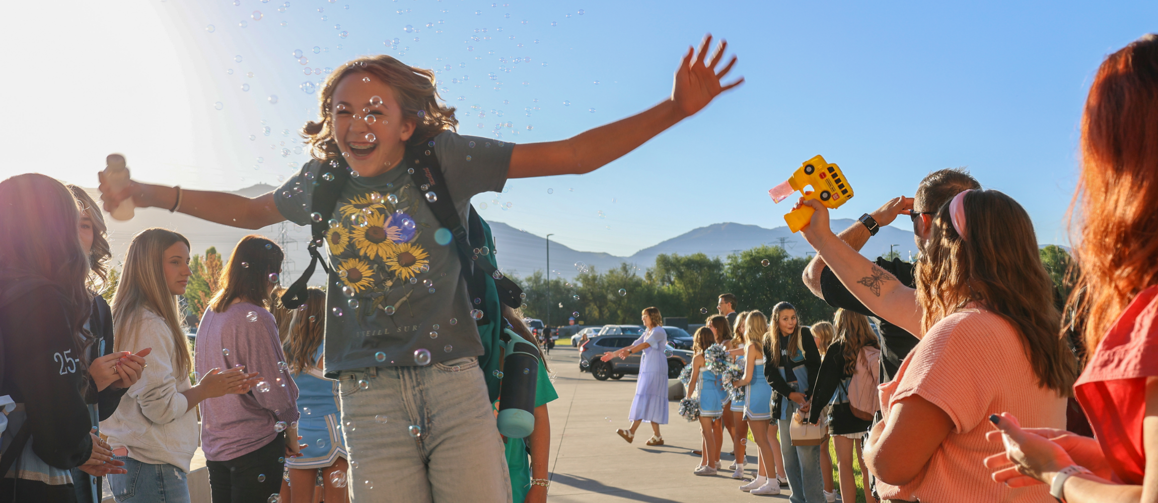 Students playing with bubbles