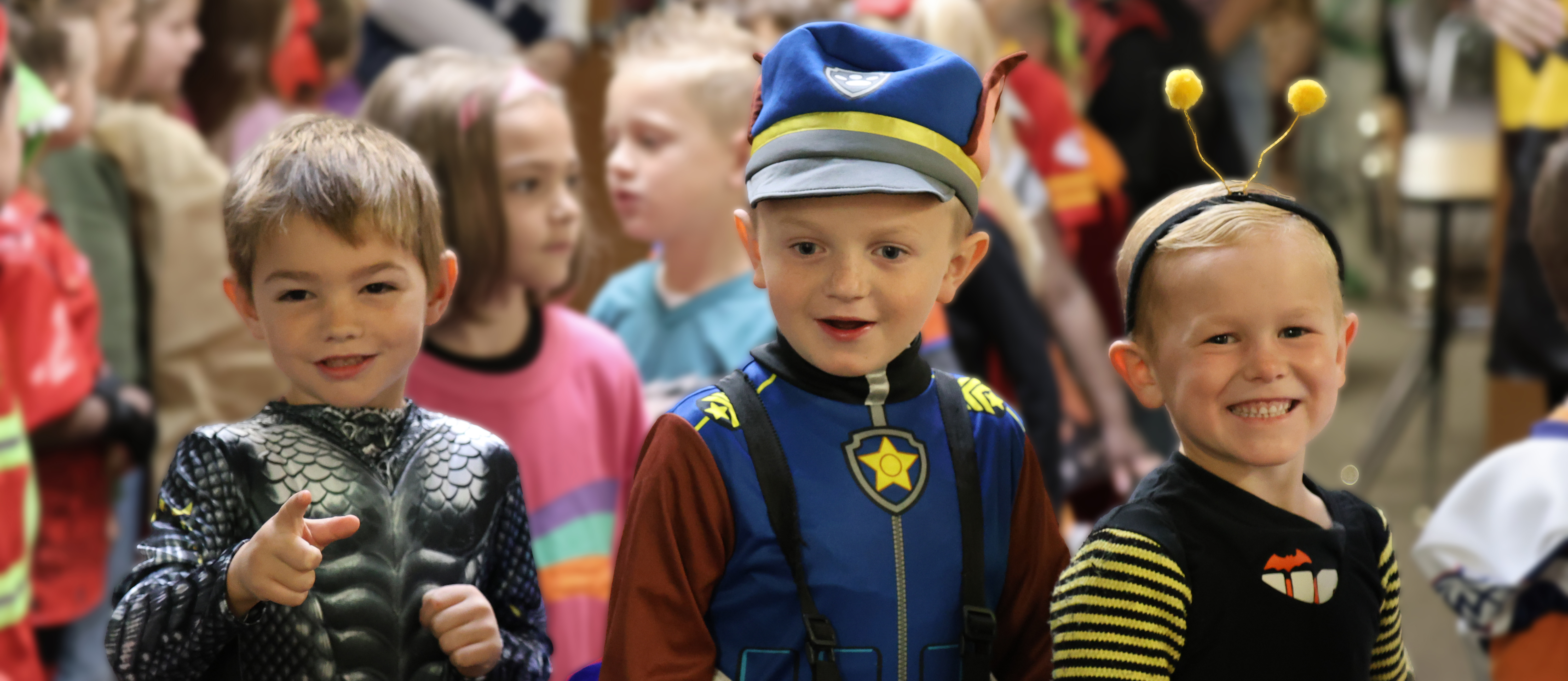 Students wearing Halloween costumes at school.