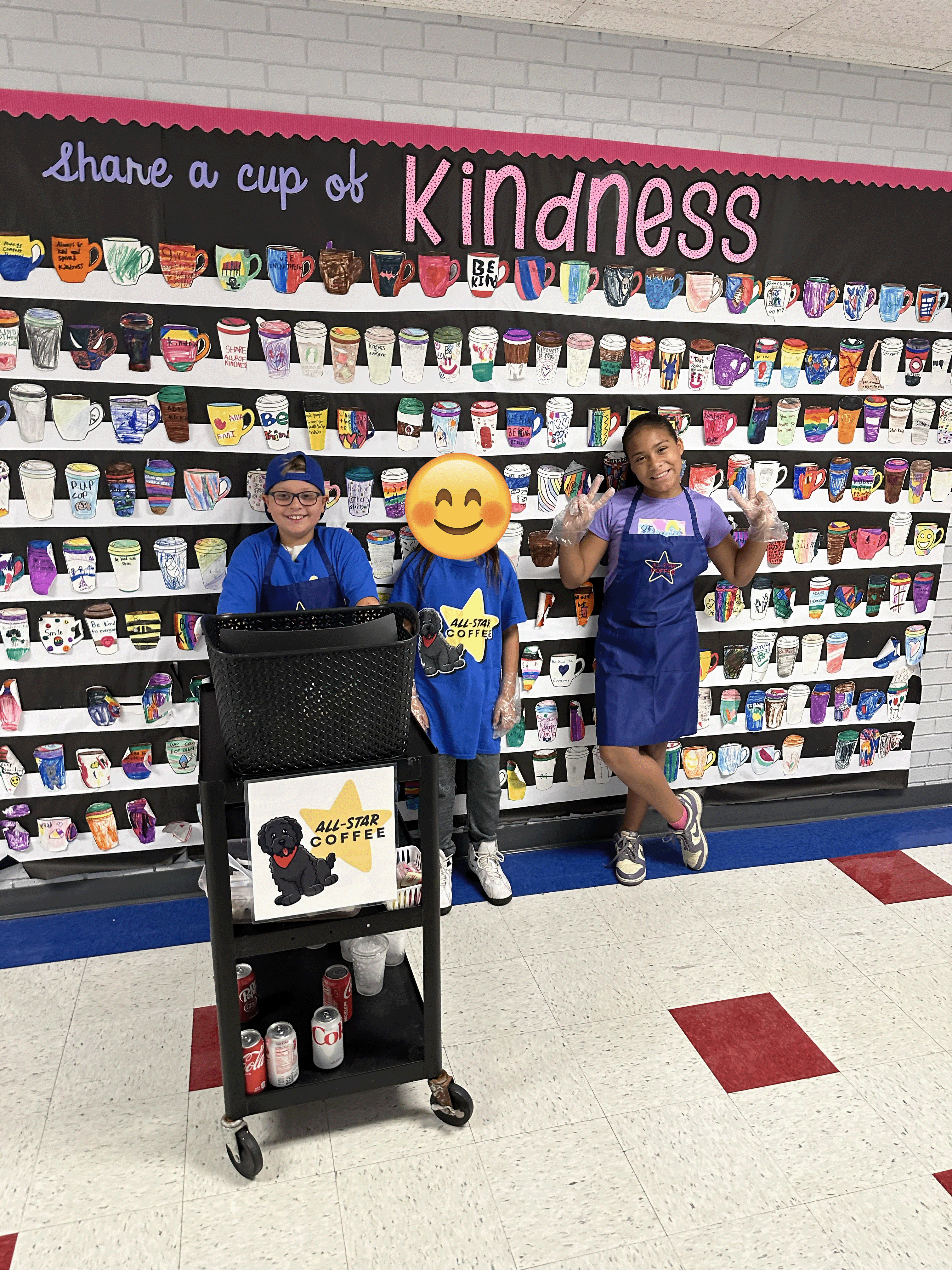 Coffee Crew in front of the Kindness Wall