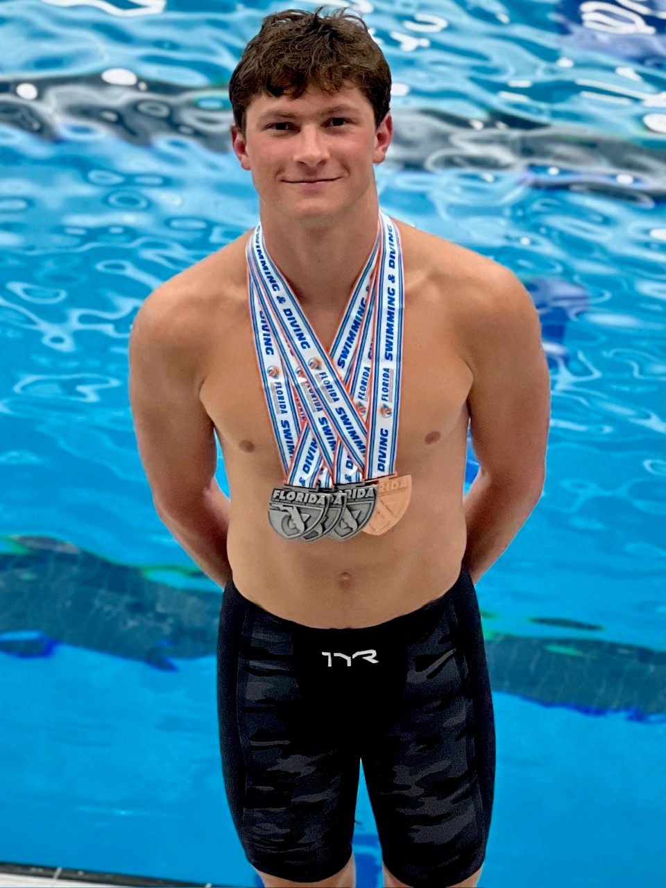 Gavin with Medals