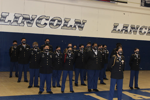 soldiers standing at the school gym 