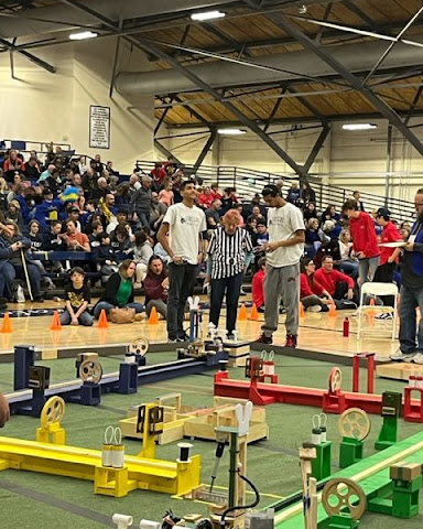 school event and people sitting on the stands 