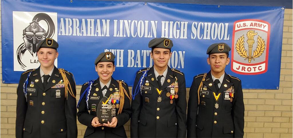 shooting team headshot holding a trophy