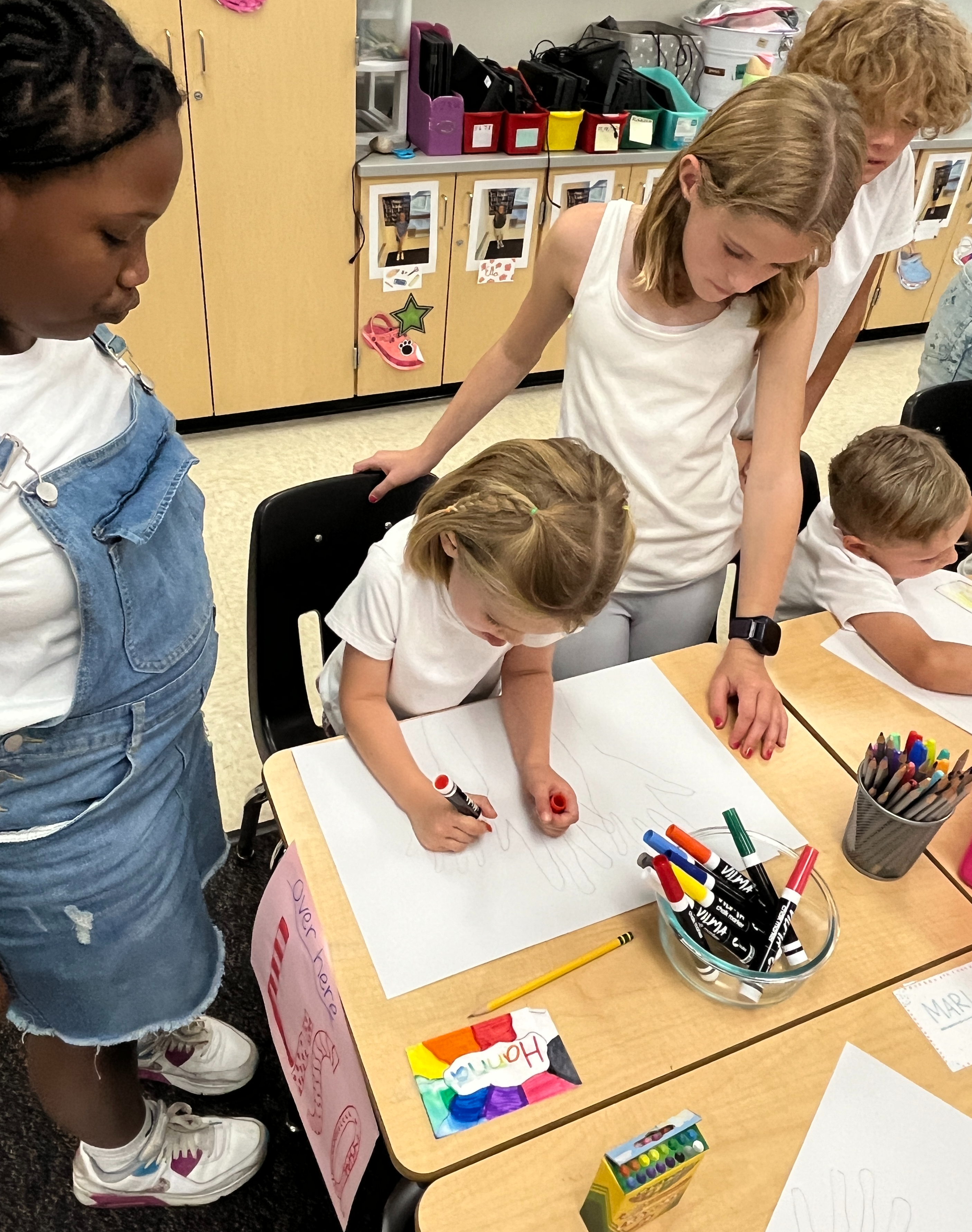 Older students helping younger students