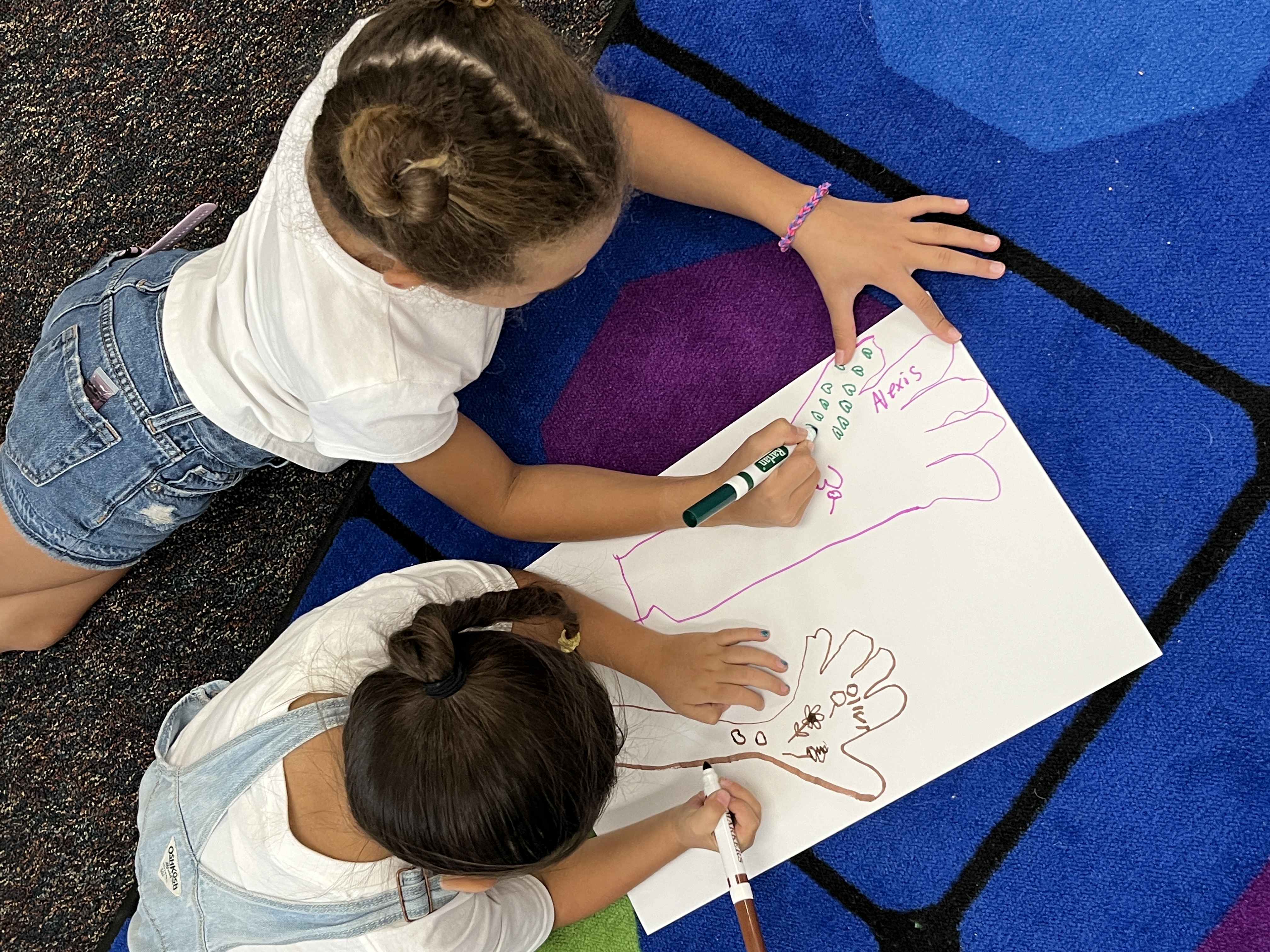 Two students drawing