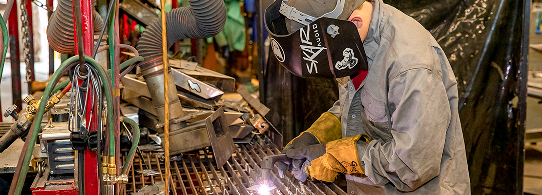 Student working on welding tec