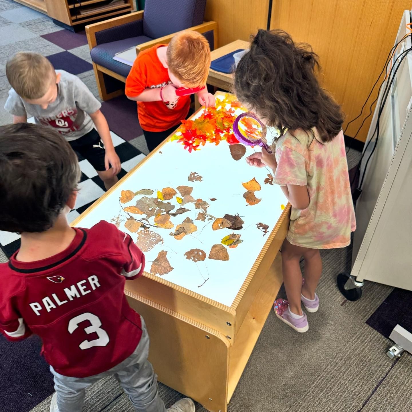 Students working on light-table