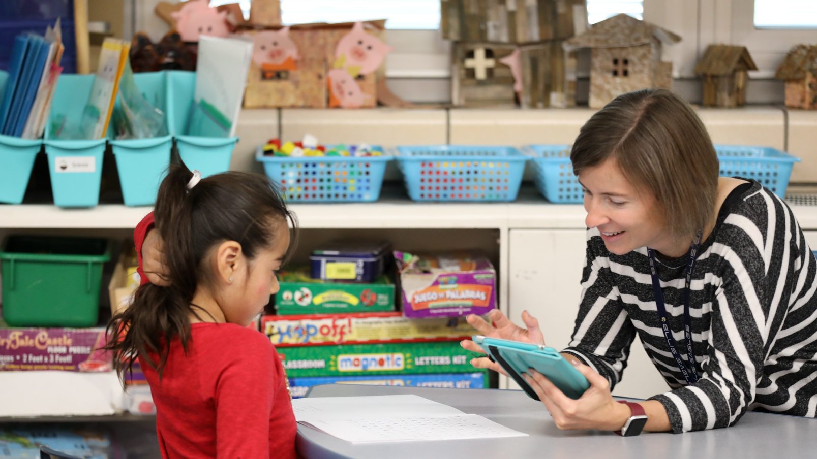 Teacher and student learning  with a tablet