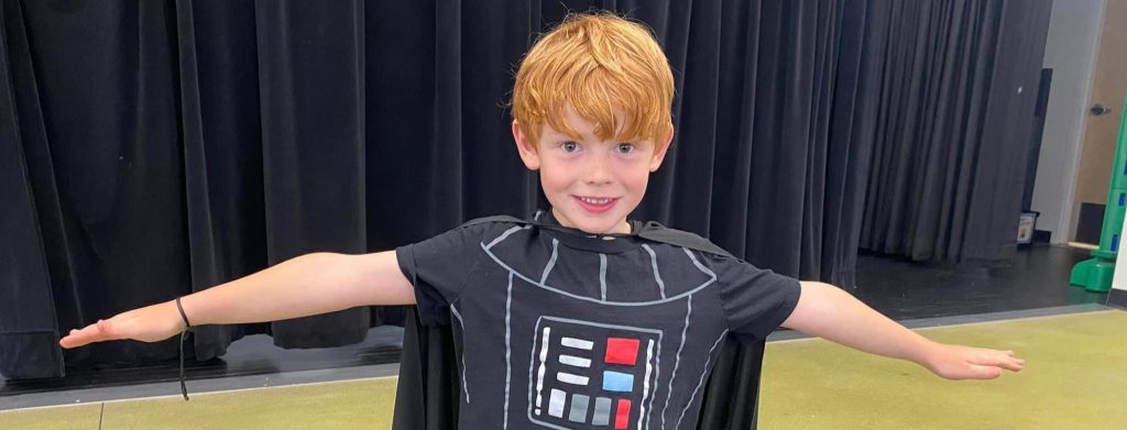 kid with star wars costume