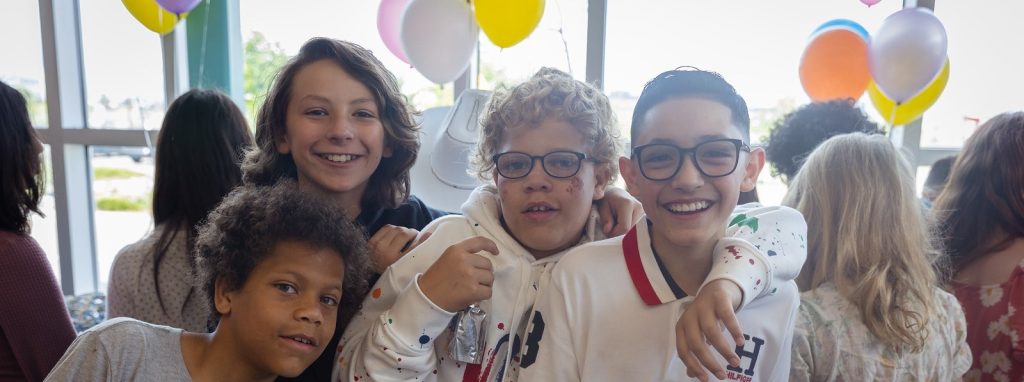 kids smiling to camera