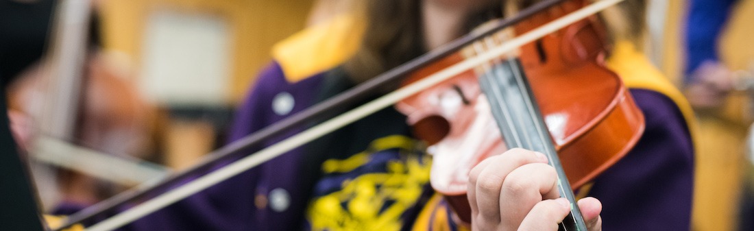 Student playing violin