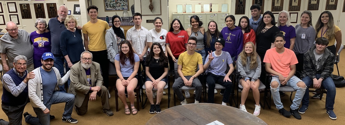 students and teachers smiling
