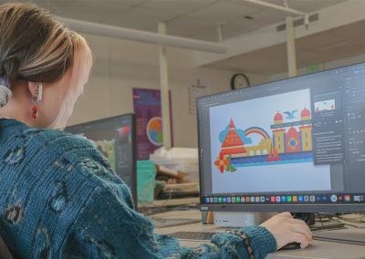 student working on computer